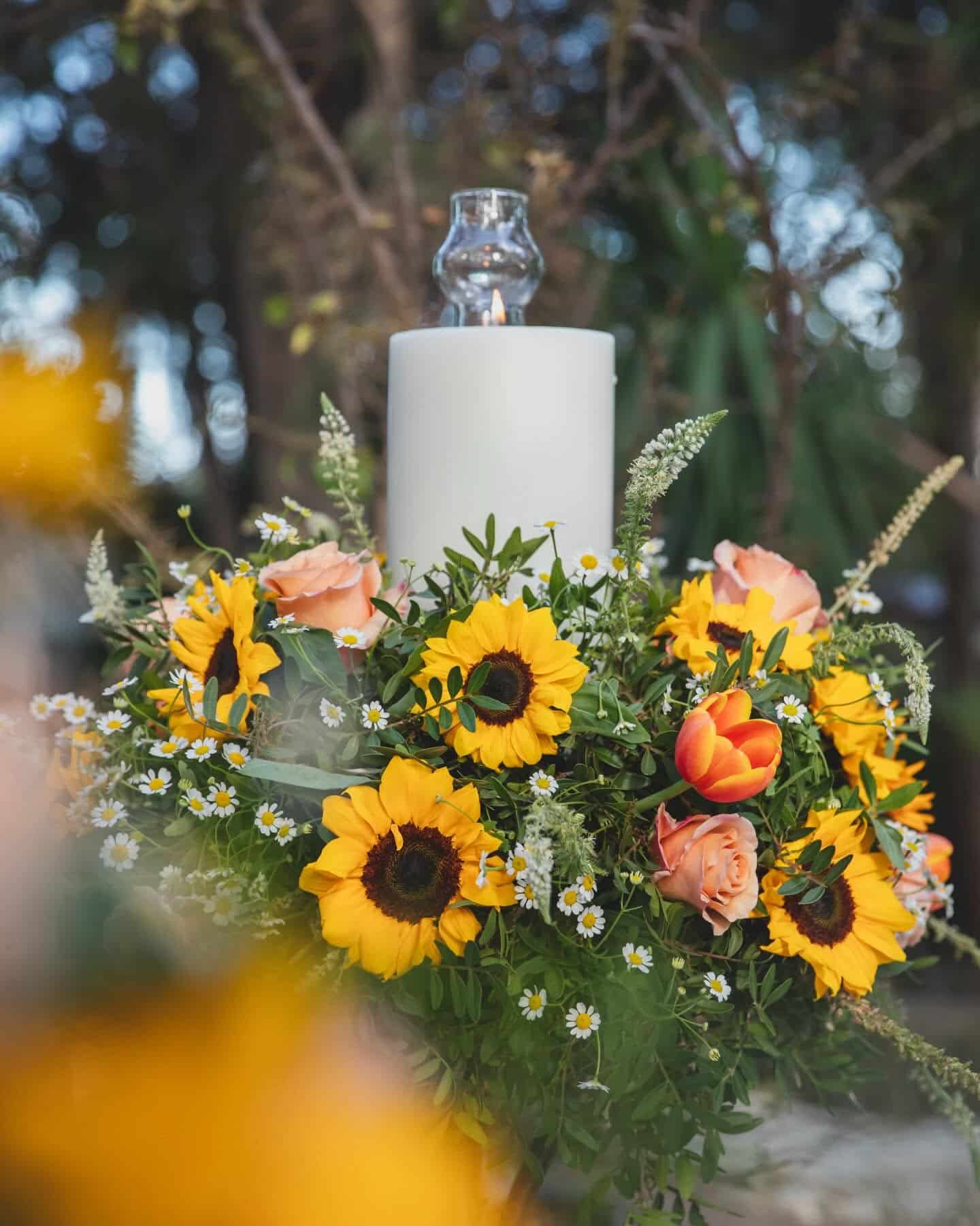 Sunflower and wildflower wedding centerpiece at an outdoor wedding venue in Athens, Greece