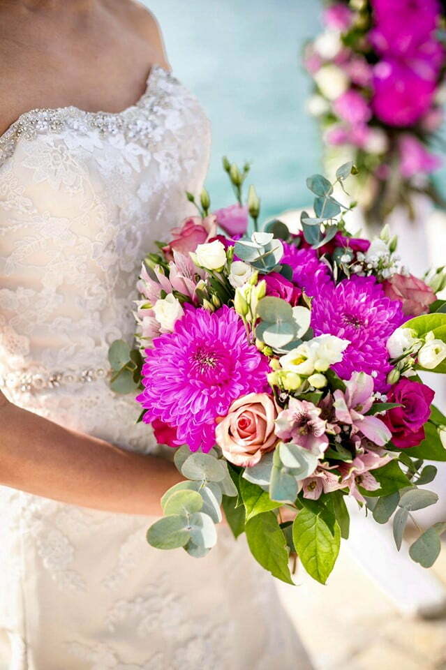 Beautiful bridal bouquet of hot-pink dahlias